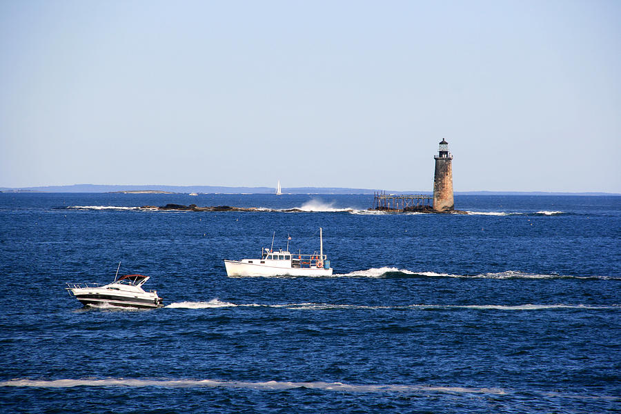 Motoring by the Ram Island Ledge Lighthouse Photograph by George Jones