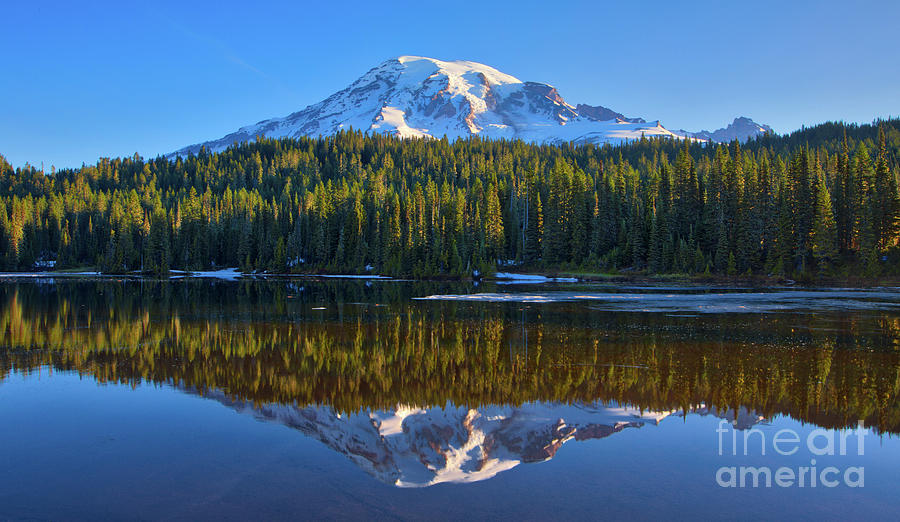Mount Rainier reflecting on Reflection Lake Photograph by Jerry Fornarotto