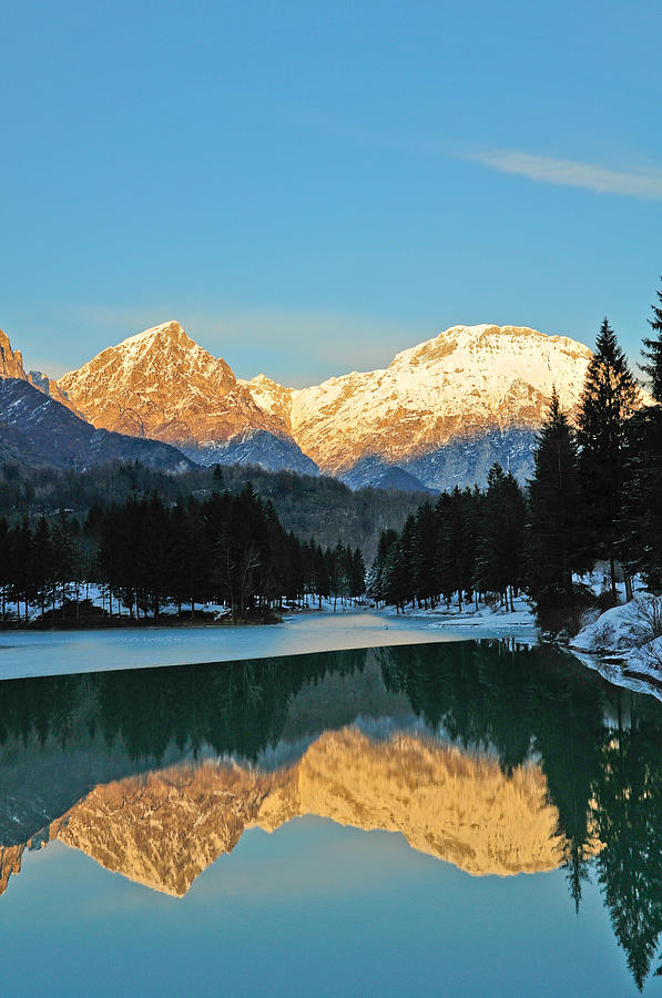 Mountain reflections on Lago di Barcis Photograph by Emilio Lovisa