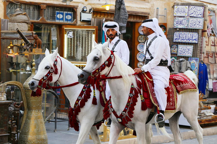 Mounted police patrol popular Doha souq market during Gulf crisis Photograph by Paul Cowan