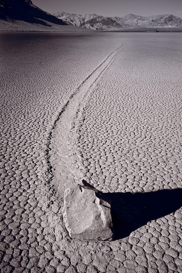 Moving Rocks Number 2  Death Valley BW Photograph by Steve Gadomski