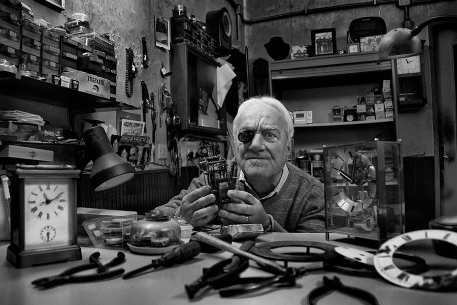 Black And White Photograph - Mr. Ciro The Watchmaker by Antonio Grambone