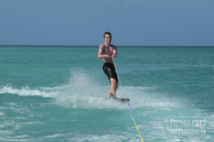 Muscular Young Guy Riding a Wakeboard in Aruba Photograph by DejaVu Designs
