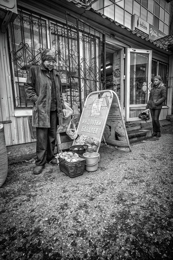 Mushroom Seller in Cloak Photograph by John Williams