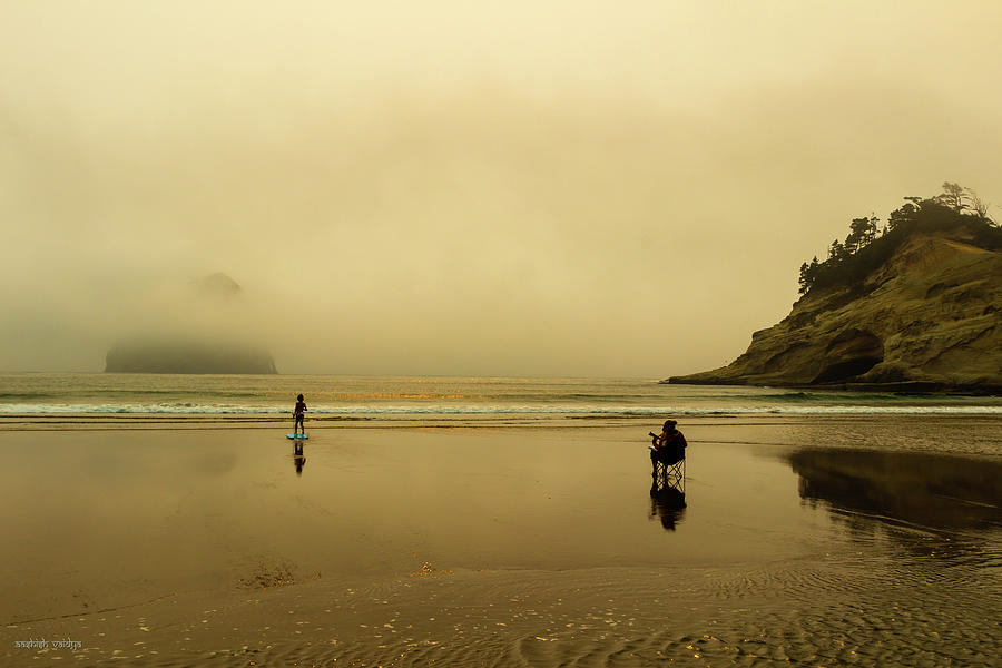 Musician and Kid at the Beach Photograph by Aashish Vaidya