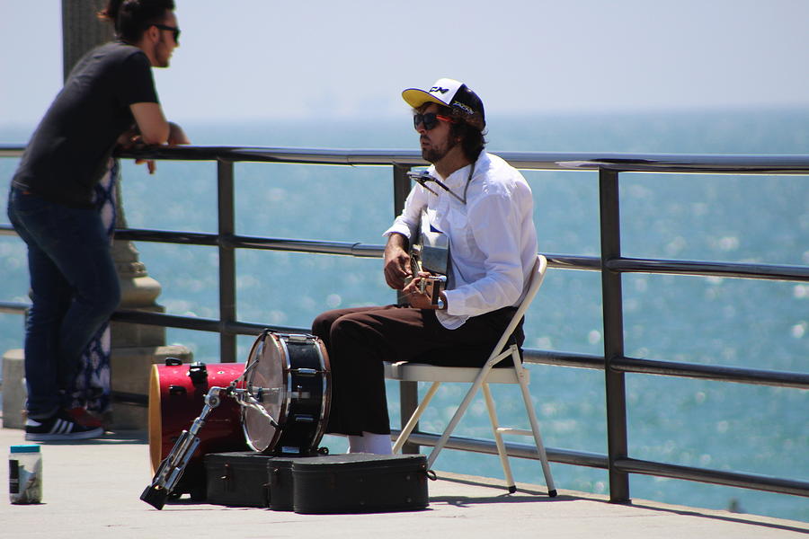 Musician on Pier Hunting Beach Photograph by Colleen Cornelius