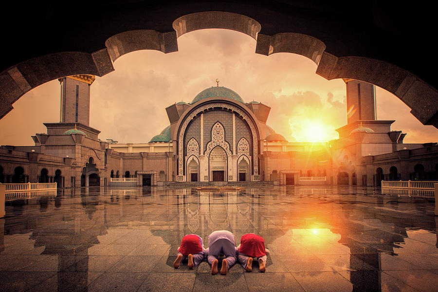Muslim chilgren sin and pray in mosque Photograph by Anek Suwannaphoom