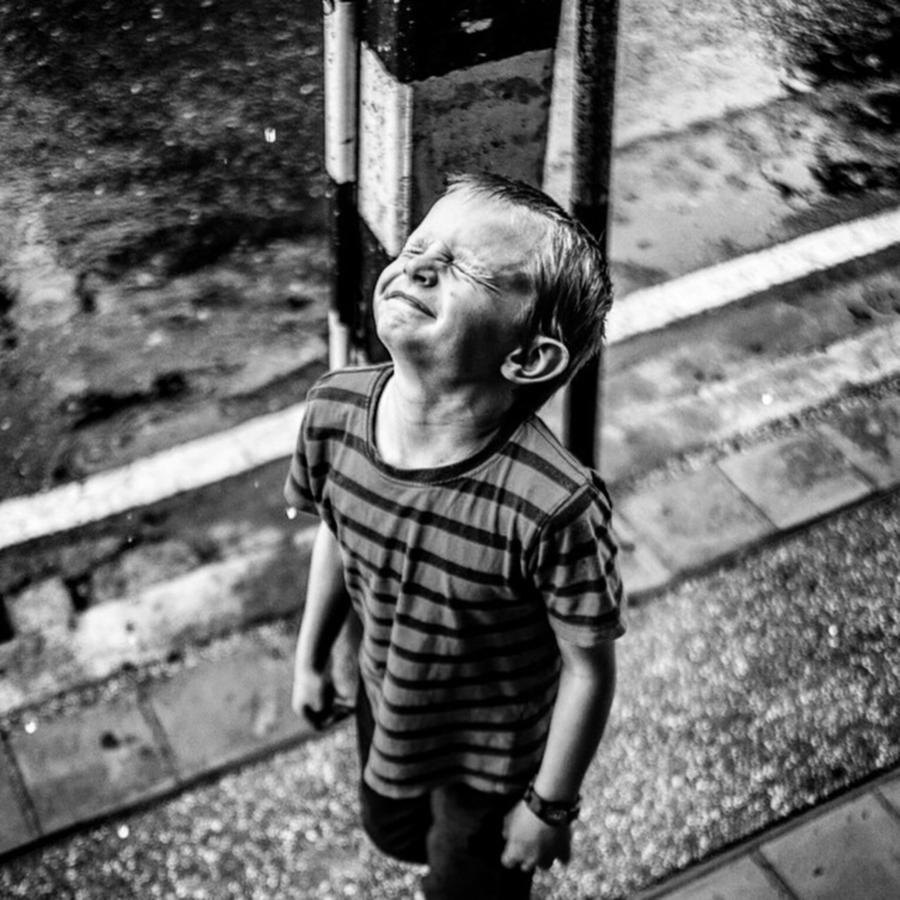 Family Photograph - My Son, Micah Enjoying The Rain by Aleck Cartwright
