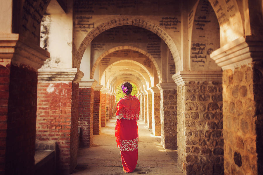 Myanmar lady atanding in the ancient emple  Photograph by Anek Suwannaphoom