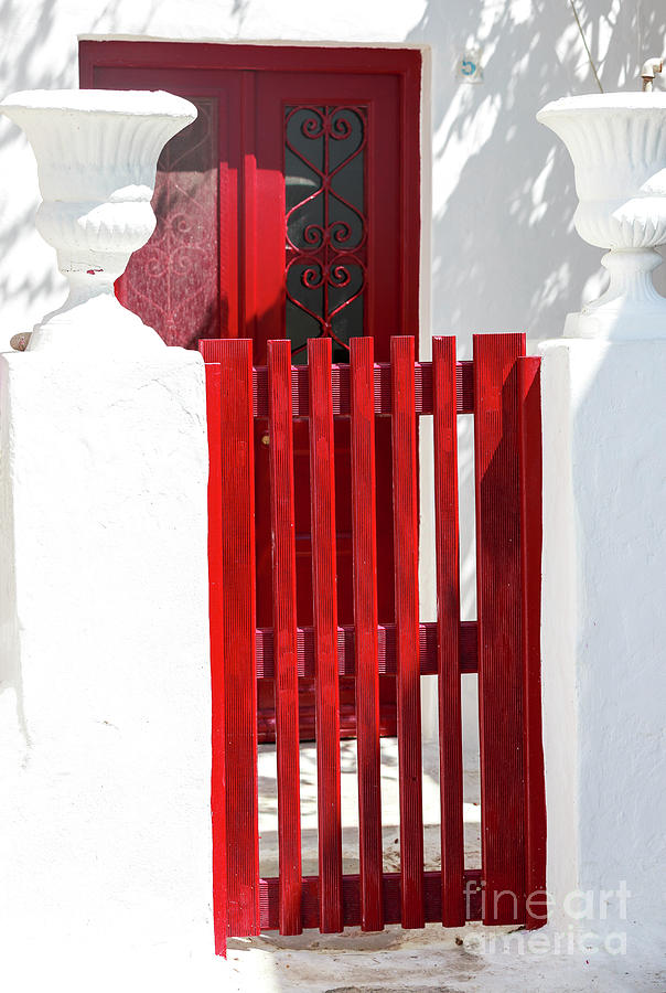 Mykonos Red Gate Photograph by John Rizzuto