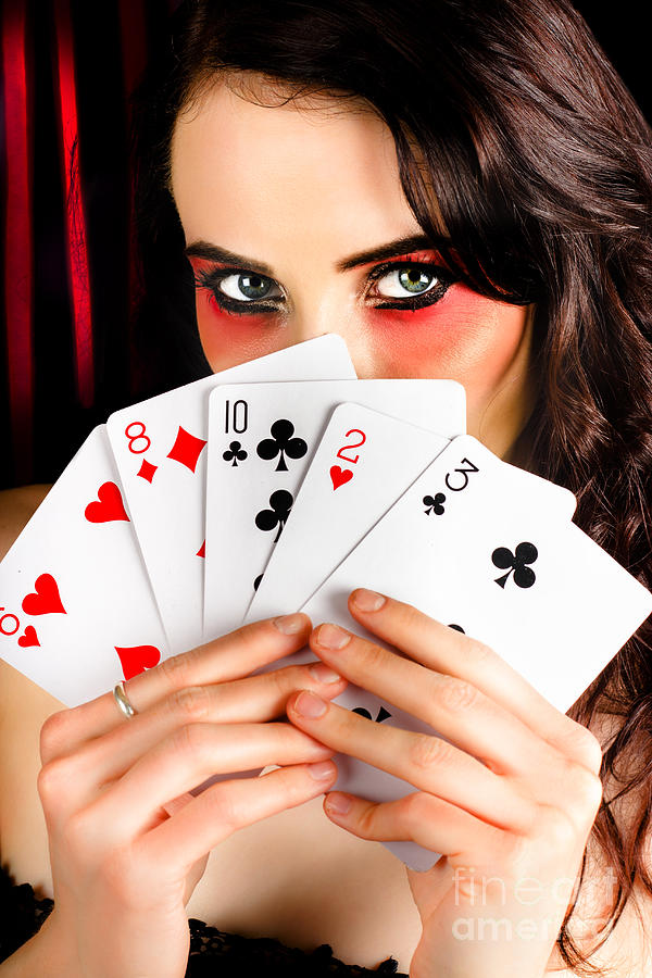 Mysterious female holding deck of playing cards Photograph by Jorgo Photography