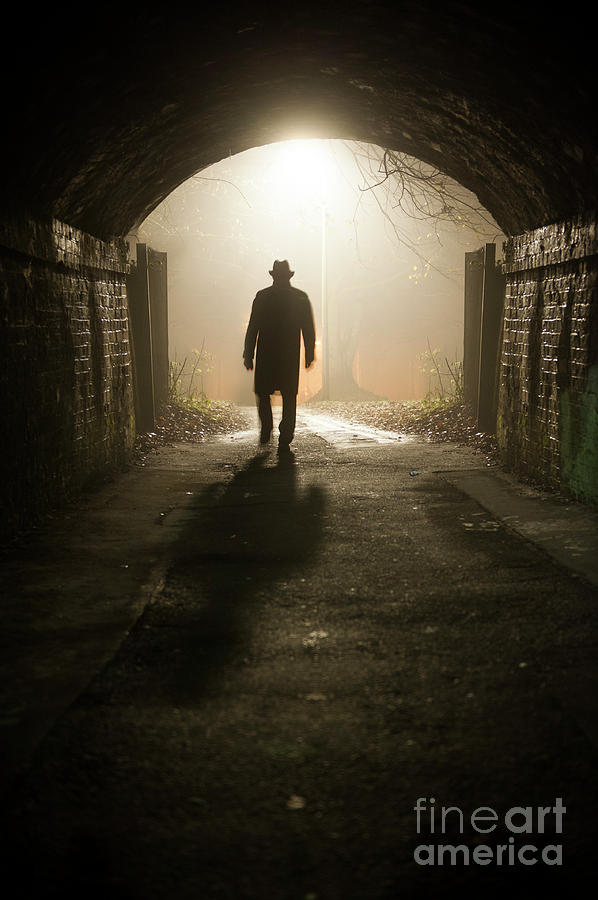 Mysterious Man Walking In A Tunnel At Night Photograph by Lee Avison