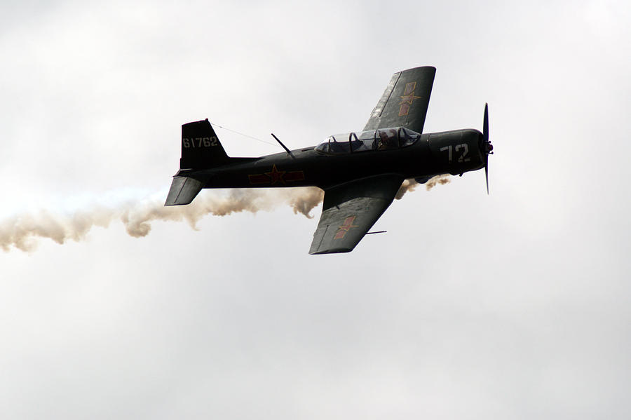 Nanchang CJ6 fighter in flight Photograph by Chris Day