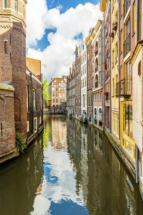 Narrow Amsterdam canal Photograph by Mihai Andritoiu