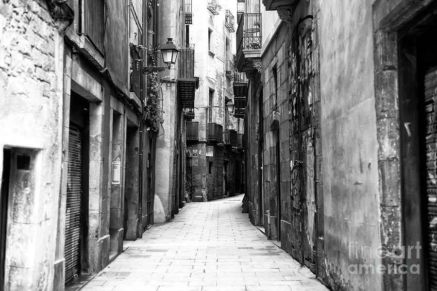 Narrow Street in the Barcelona Gothic Quarter Photograph by John Rizzuto