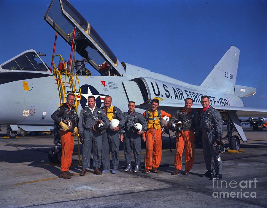 NASA Mercury astronauts standing beside a Convair 106 B aircraft Photograph by Vintage Collectables