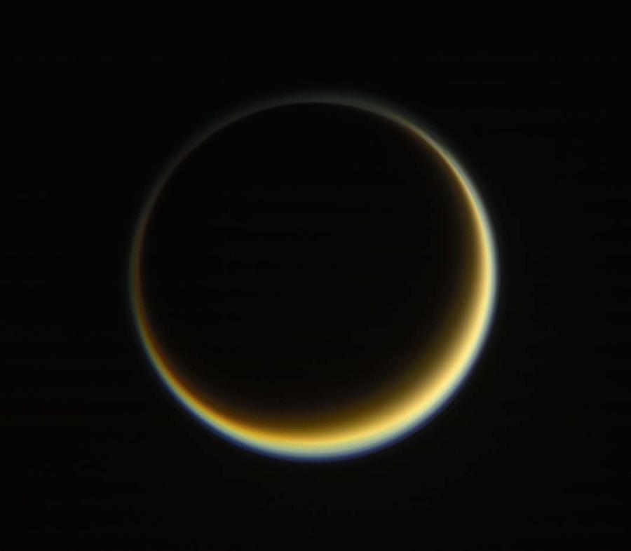 NASA s Cassini spacecraft looks toward the night side of Saturns moon Titan i Painting by Celestial Images