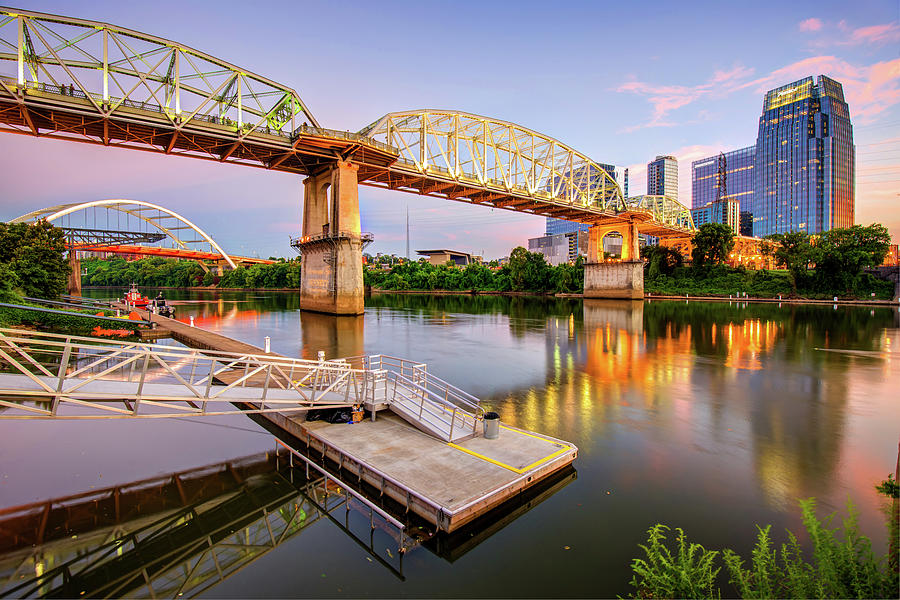America Photograph - Nashville Pedestrian and Gateway Bridge at Dusk by Gregory Ballos
