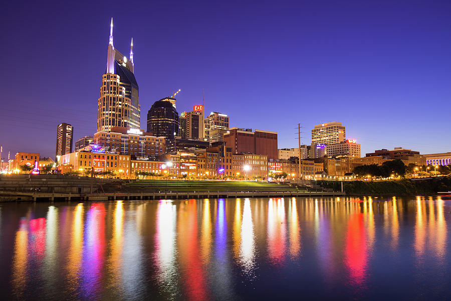 Nashville Skyline at Night on the Cumberland River Photograph by Gregory Ballos
