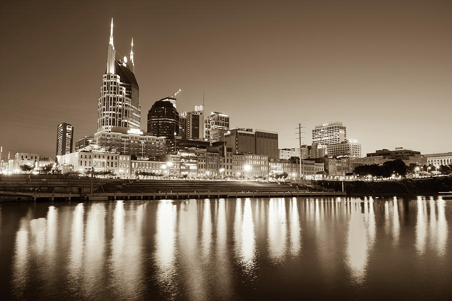 Nashville Photograph - Nashville Skyline at Night on the Cumberland River Sepia by Gregory Ballos