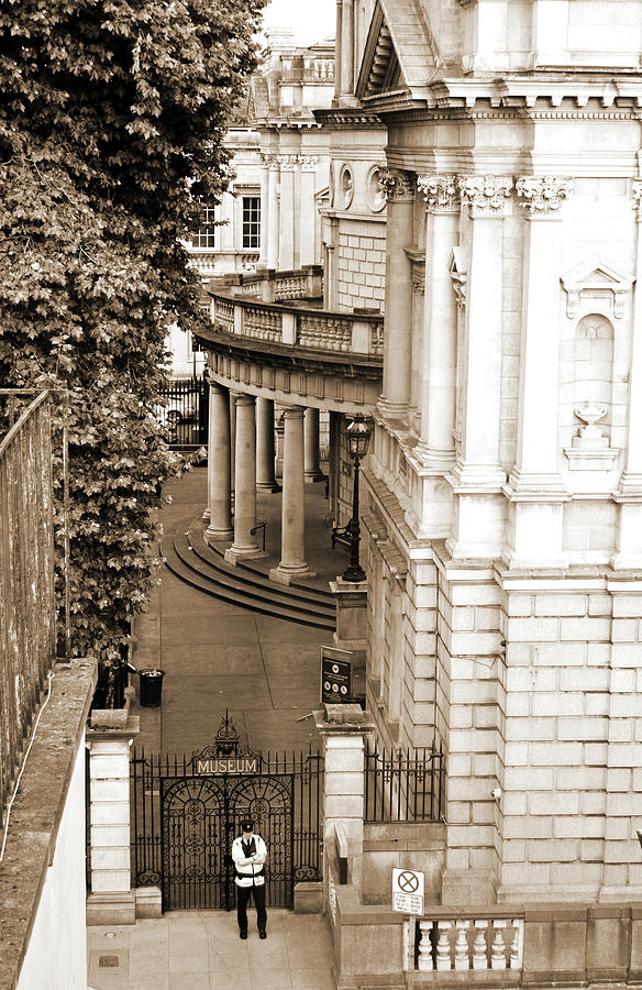 National Museum of Archeology Side Entrance Gate and Garda Dublin Ireland Sepia Photograph by Shawn OBrien