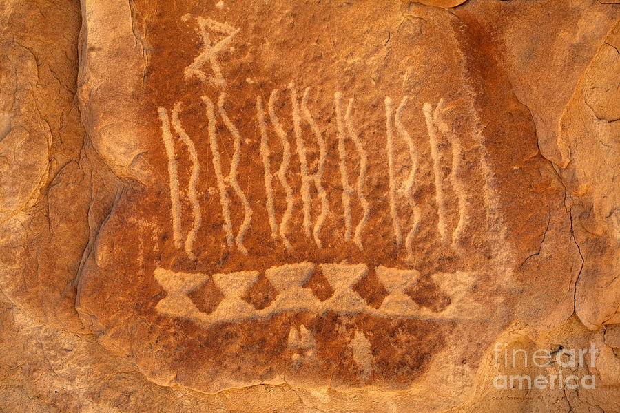 Native American Petroglyph On Orange Sandstone Photograph by Lone Palm Studio