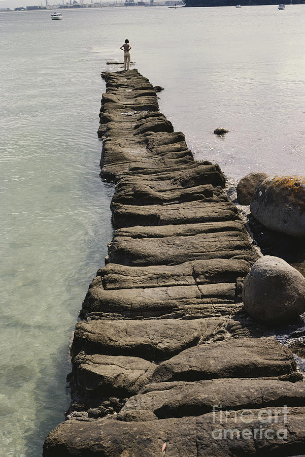Natural Jetty Formed By Igneous Rock Photograph by G. R. Roberts