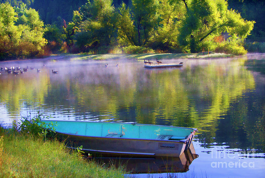 Nature Pond Boat Seasons  Photograph by Chuck Kuhn