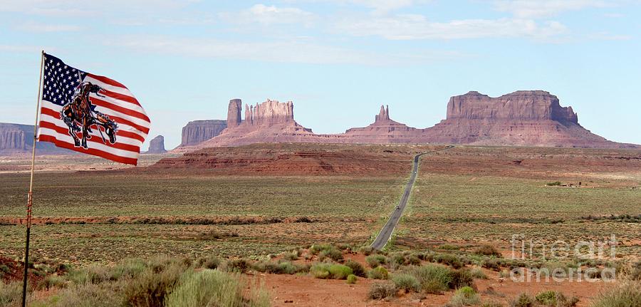 Navajo Flag at Monument Valley Photograph by Suzanne Oesterling