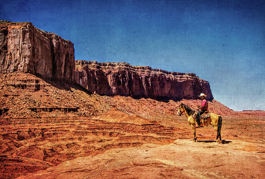 Navajo Horseman in Monument Valley Photograph by Carolyn Derstine