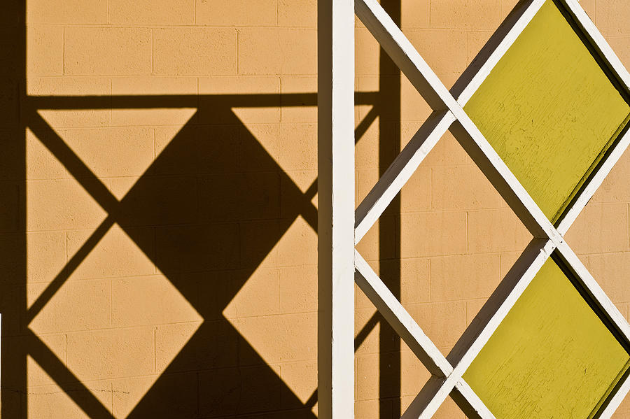 Lattice work and shadows Photograph by Gary Warnimont