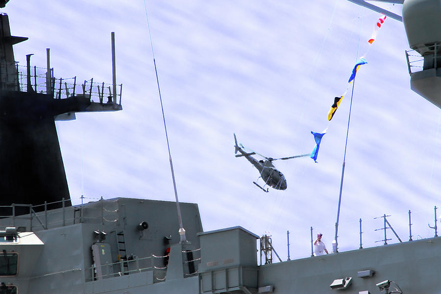 Navy Helicopter Flying Over HMAS Adelaide Photograph by Miroslava Jurcik
