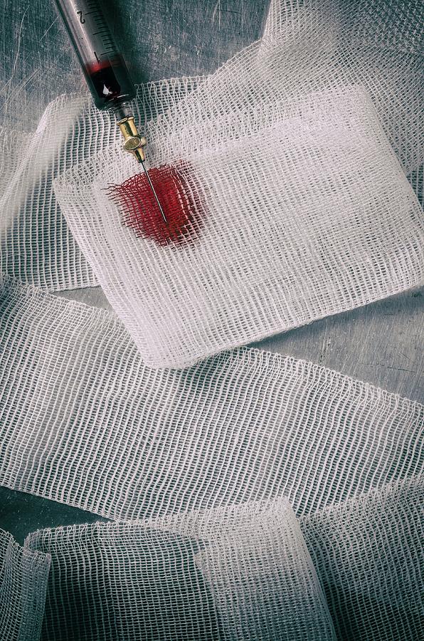 Needle Dropping Blood Photograph by Carlos Caetano