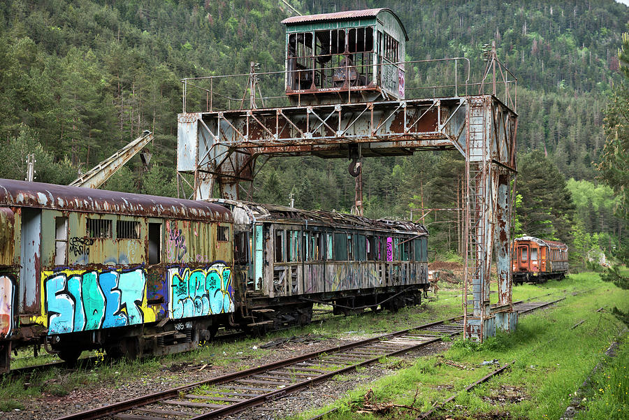 Neglected train in the abandoned Canfranc International Railway Station Photograph by RicardMN Photography