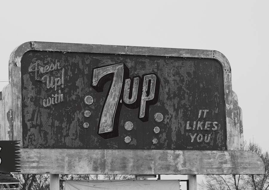 Black And White Photograph - Neon 7up Sign Merced CA by Troy Montemayor