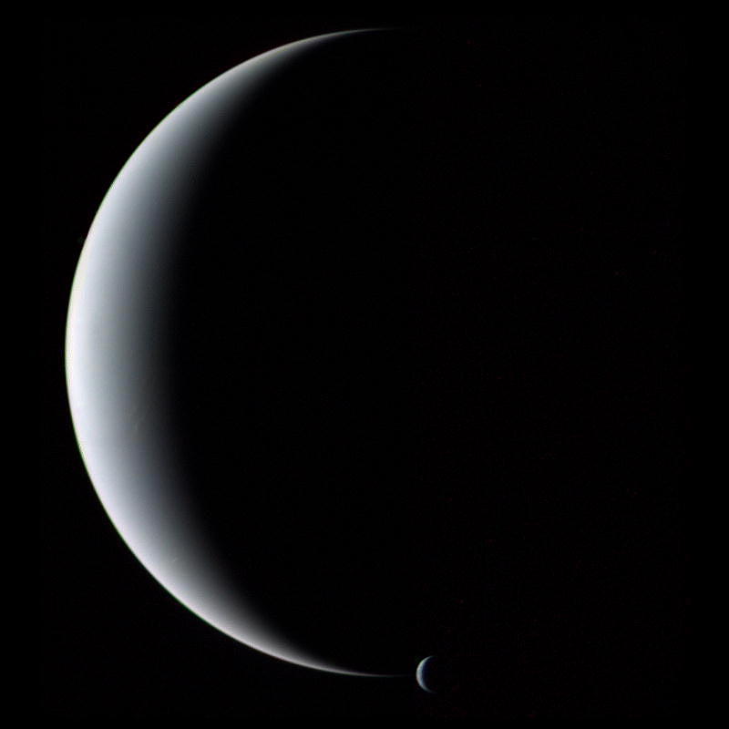 Neptune and Triton Photograph by Eric Glaser