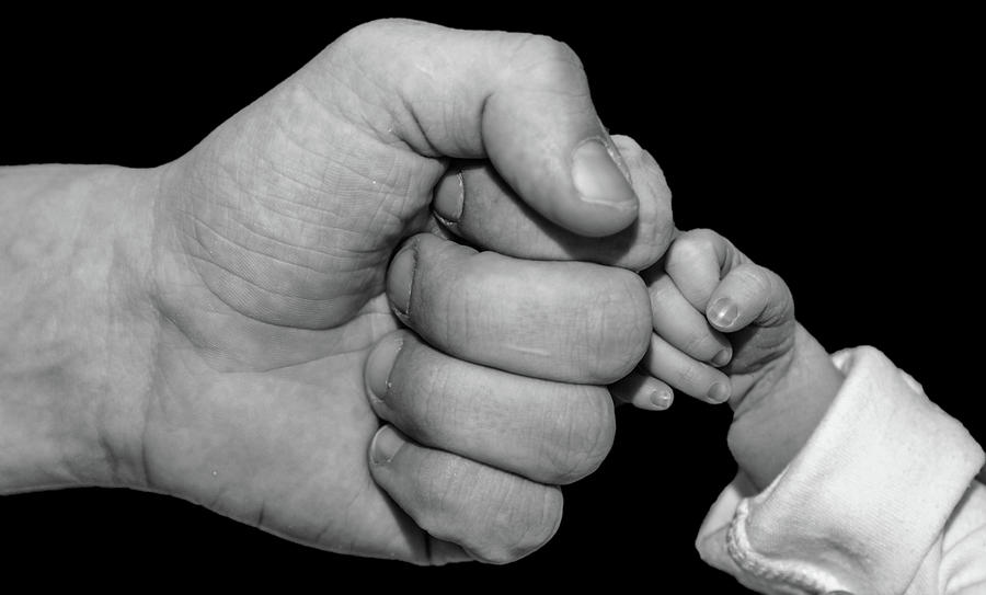 New born fist bump Photograph by Joe Holley