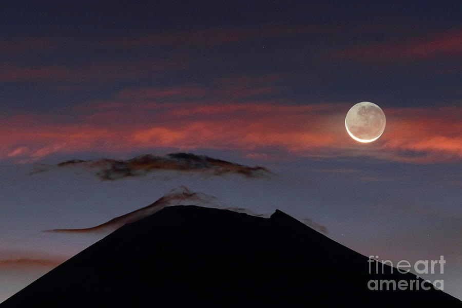 New Moon and Parinacota Volcano Photograph by James Brunker