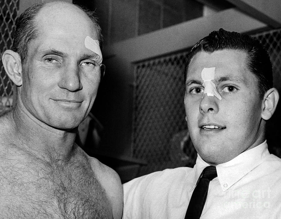 New York Giants Y. A. Tittle and Lineman Ken Byers show off their