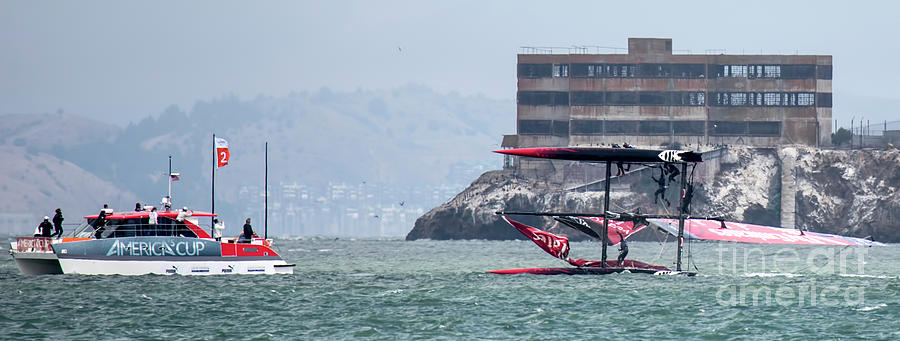 New Zealand hanging on Americas Cup Overturns  Photograph by Chuck Kuhn