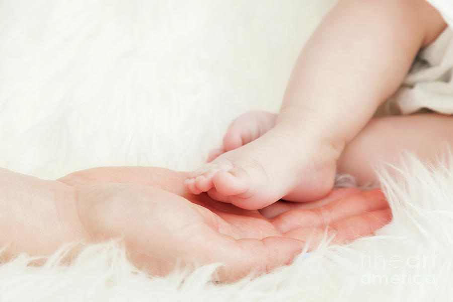 Download Newborn Baby Foot In Mother S Hand Child Care Love Protection Photograph By Michal Bednarek