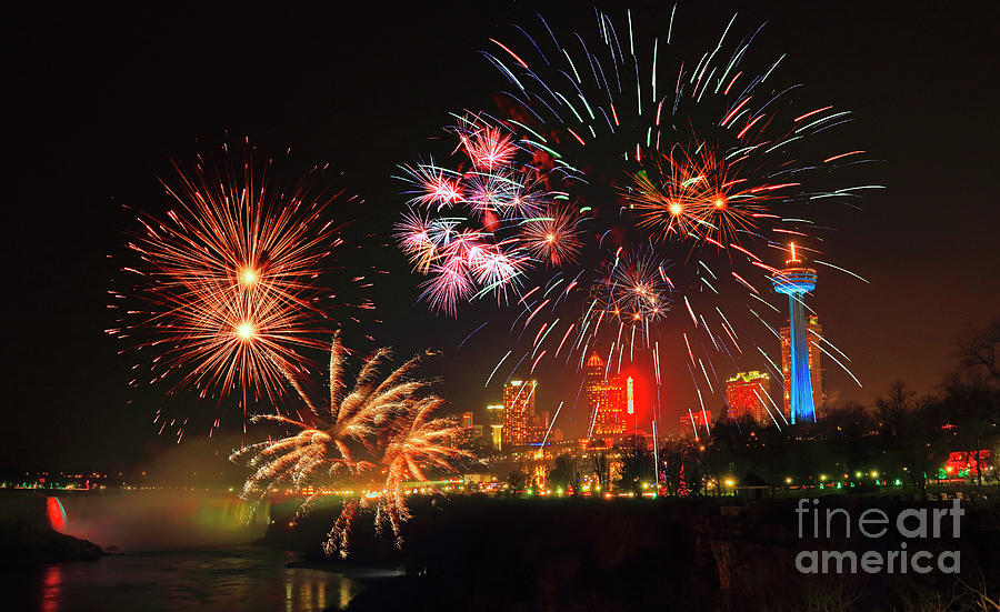 Niagara Falls With Holiday Fireworks Photograph by Charline Xia