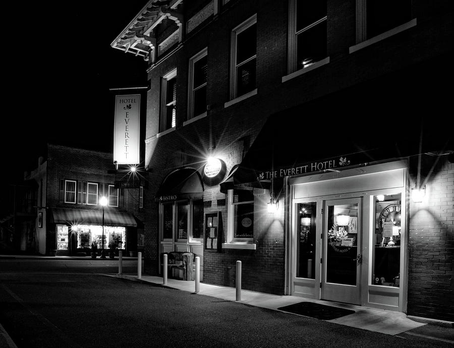 City Photograph - Night At The Everett Hotel In Black and White by Greg and Chrystal Mimbs