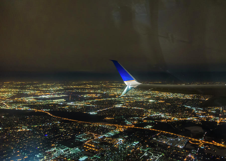 Night Flight Photograph by Robert Potts
