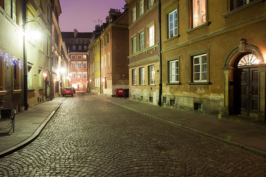 Architecture Photograph - Night in the Old Town of Warsaw in Poland by Artur Bogacki