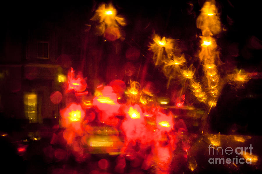 Night Light trails on a city street Photograph by Raimond Klavins