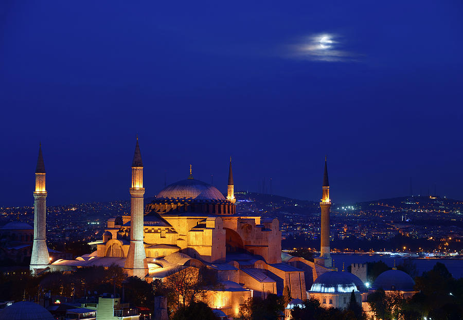 Turkey Photograph - Night lights on Hagia Sophia under a full moon at twilight in Is by Reimar Gaertner