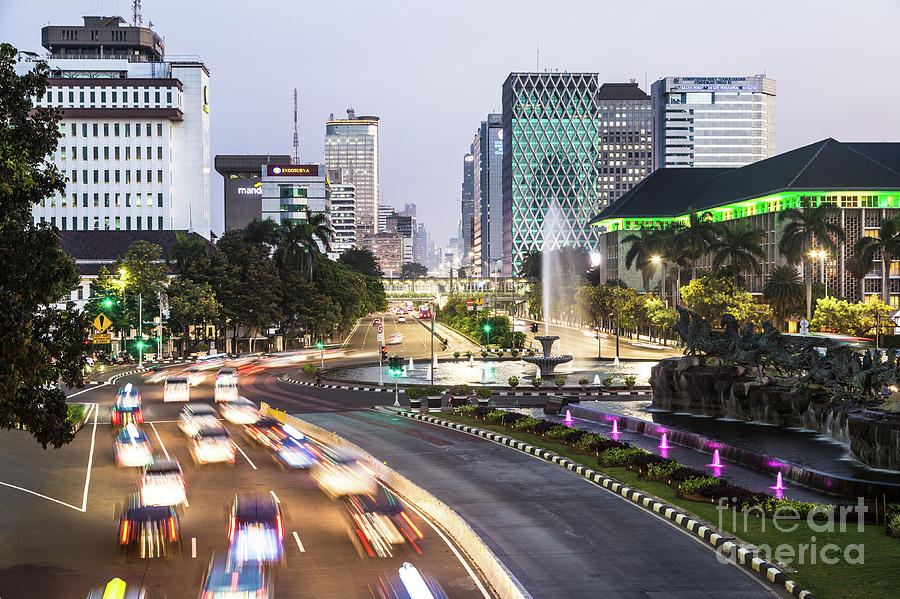Night traffic rush in Jakarta Photograph by Didier Marti