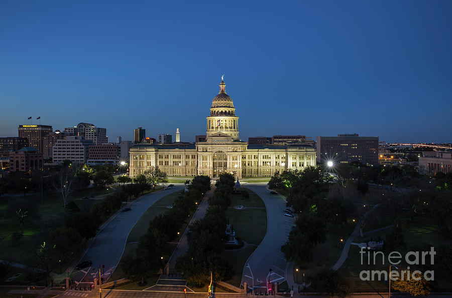 Architecture Photograph - Nighttime shot of the floodlit Texas State Capitol Building in Austin, Texas by Dan Herron