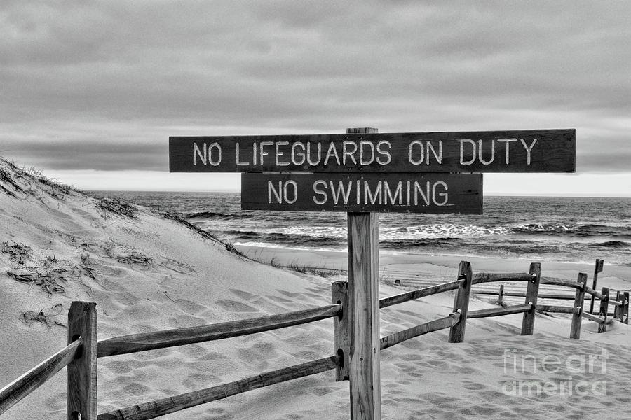 No Lifeguards on Duty black and white Photograph by Paul Ward
